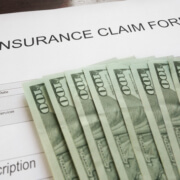 Who determines how much should be paid in underinsured motorist coverage in Wyoming?