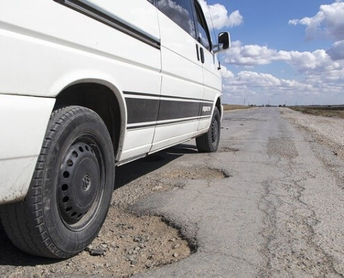 Who is responsible when a pothole causes an accident in Kendall, Florida?