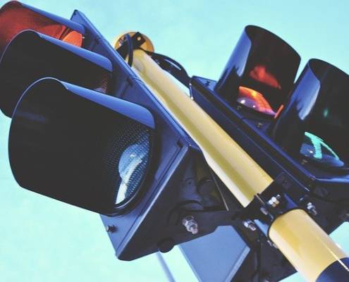 Can a driver be sued for running a red light and causing an accident in Chula Vista, California?